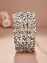 Exquisite Silver-Tone Statement Bracelet with Pink Stone Accents