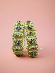 Traditional Gold Bangles with Ruby and Floral Enamel Design