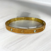 Elegant Gold-Tone Studded Bangle