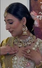 Exquisite Gold-Plated Kundan Set with Ruby and Pearl Accents