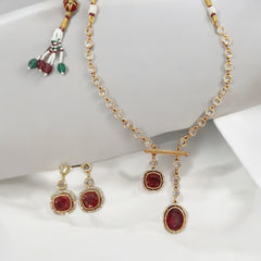 Product Description: Elegant Gold and Ruby Pendant Set with Earrings