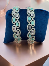 Elegant Diamond and Gemstone Bangles - Luxury Statement Jewelry