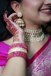 Elegant Kundan and Pearl Choker Set with Matching Earrings