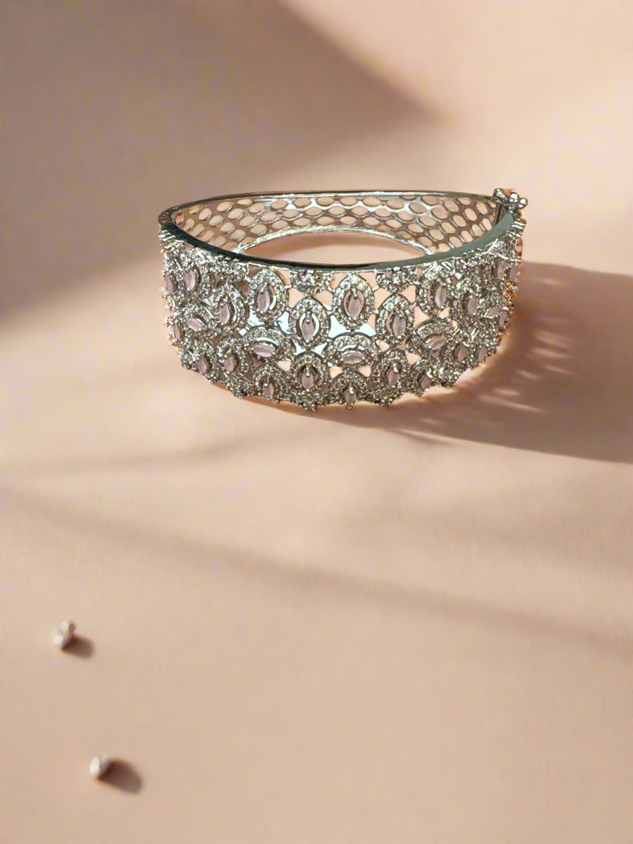 Exquisite Silver-Tone Statement Bracelet with Pink Stone Accents