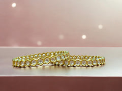 Gold-Toned Hexagonal Bangles with Sparkling Stones