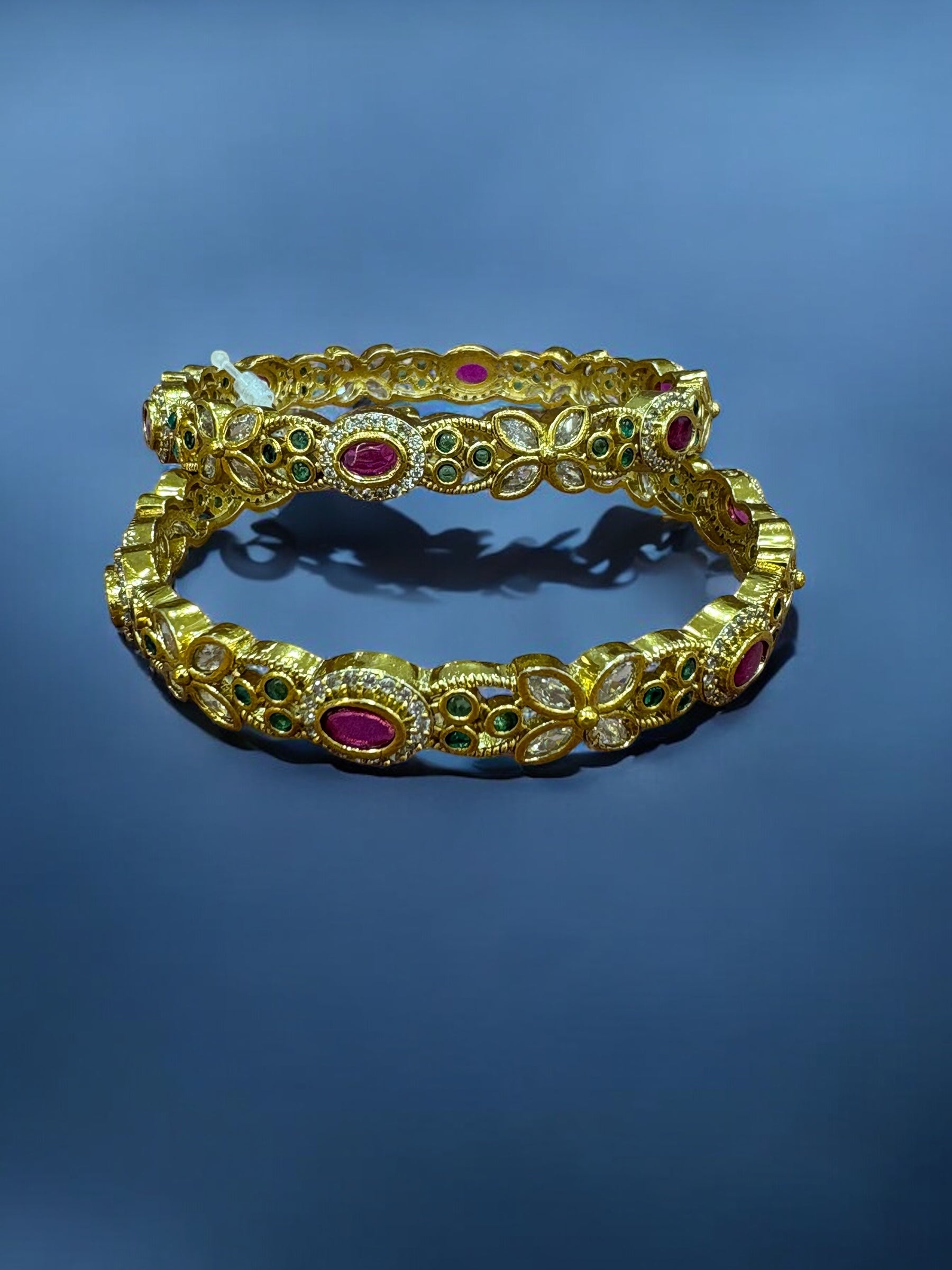 Gold-Toned Bangles with Ruby, Emerald, and Diamond Accents
