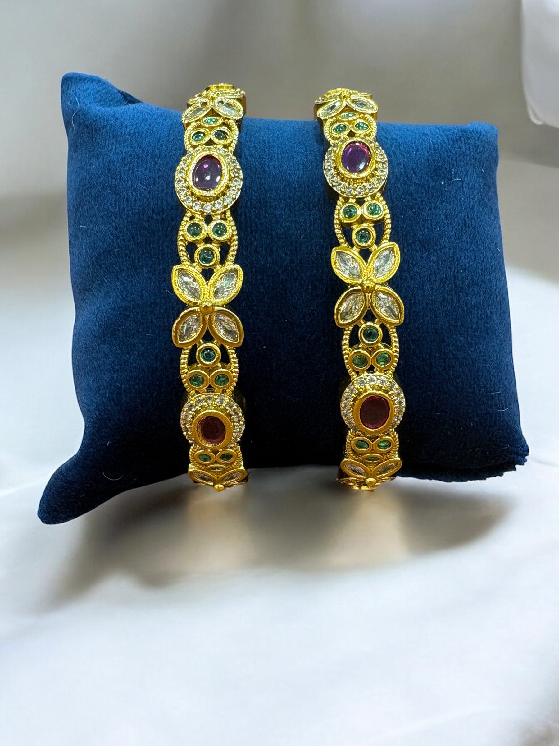 Gold-Toned Bangles with Ruby, Emerald, and Diamond Accents