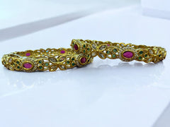 Gold-Toned Bangles with Ruby, Emerald, and Diamond Accents