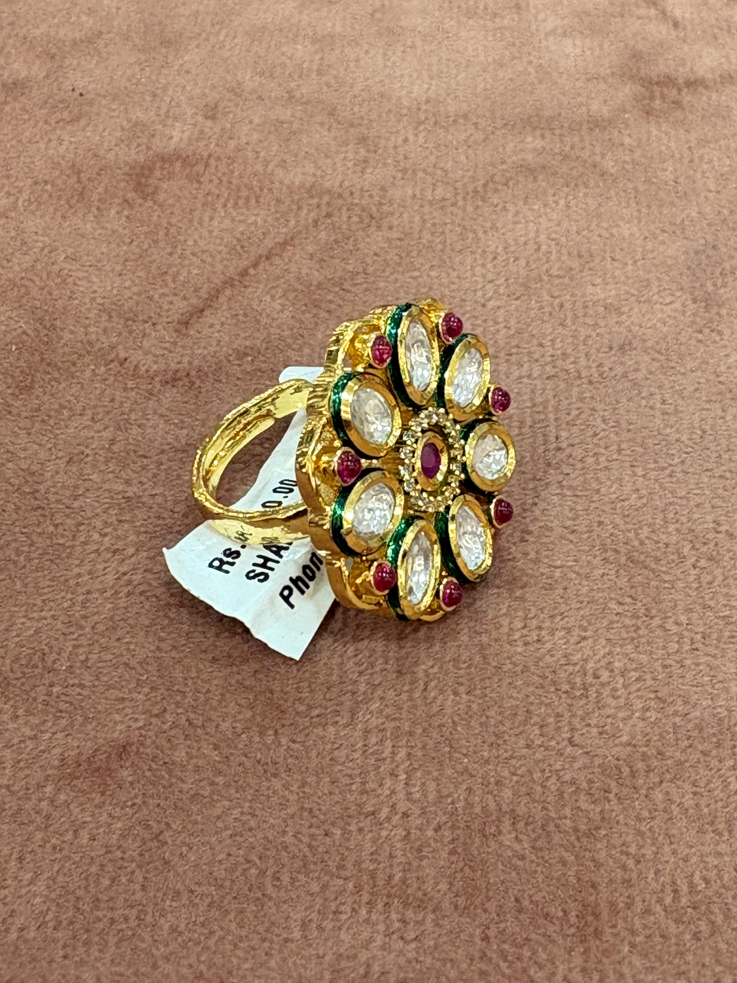 Elegant Floral Kundan Ring with Ruby and Green Enamel Accents