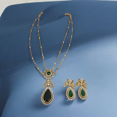 Exquisite Gold and Emerald Pendant Set with Earrings