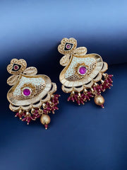Exquisite Golden Kundan Earrings with Ruby Accents