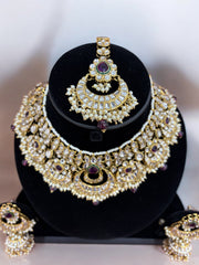 Exquisite Gold-Plated Kundan Set with Ruby and Pearl Accents